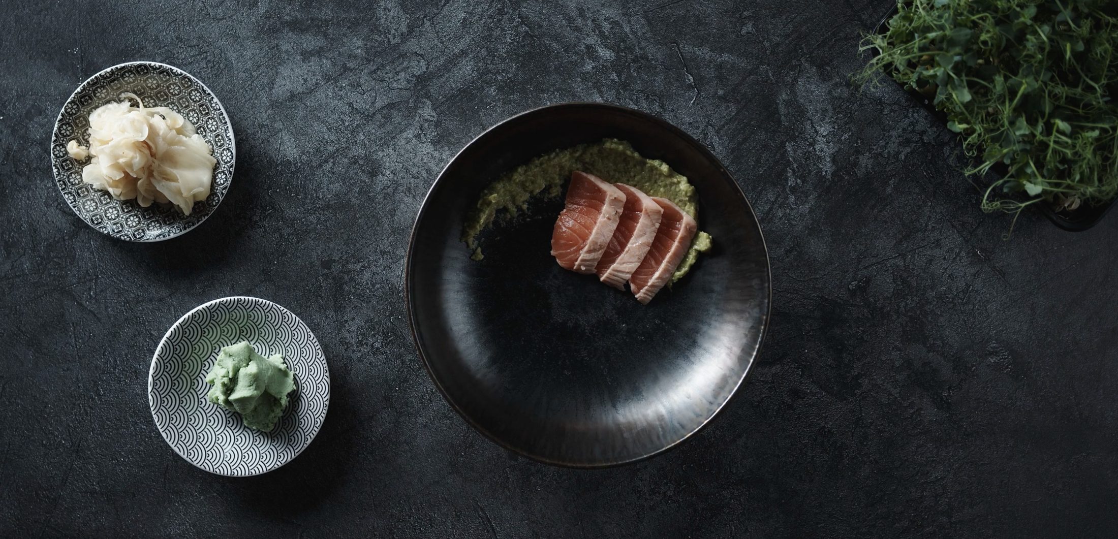 Restaurant dish on a dark stone table